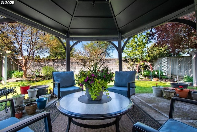 view of patio / terrace featuring a fenced backyard and a gazebo