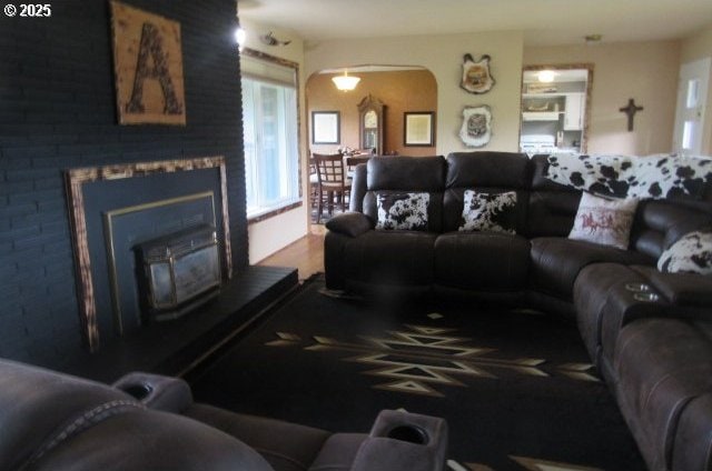 living area featuring arched walkways