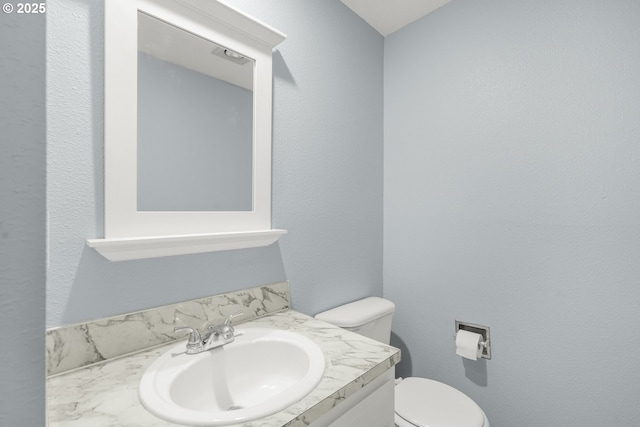 8419 SE Yamhill St, Portland, OR 97216 - half bathroom with vanity and toilet