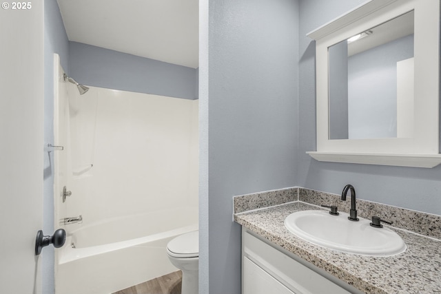 8419 SE Yamhill St, Portland, OR 97216 - full bath with toilet, vanity, shower / bath combination, and wood finished floors