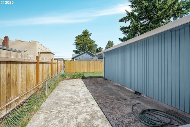 8419 SE Yamhill St, Portland, OR 97216 - fenced backyard featuring a patio