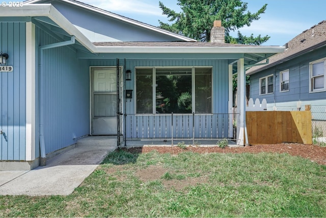 8419 SE Yamhill St, Portland, OR 97216 - doorway to property with a chimney and a porch