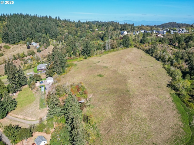 aerial view featuring a forest view