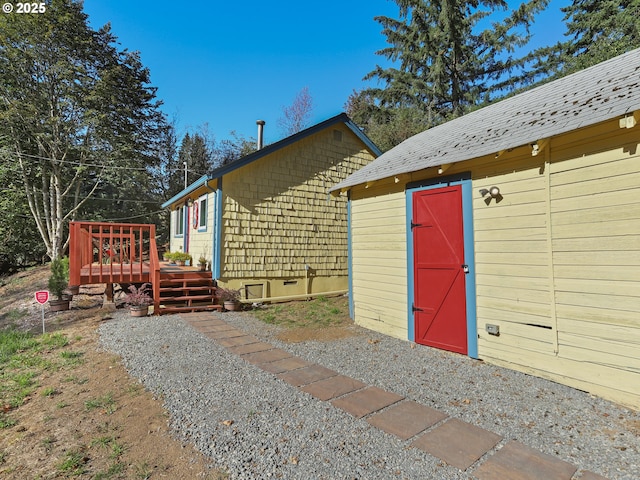 exterior space featuring an outbuilding