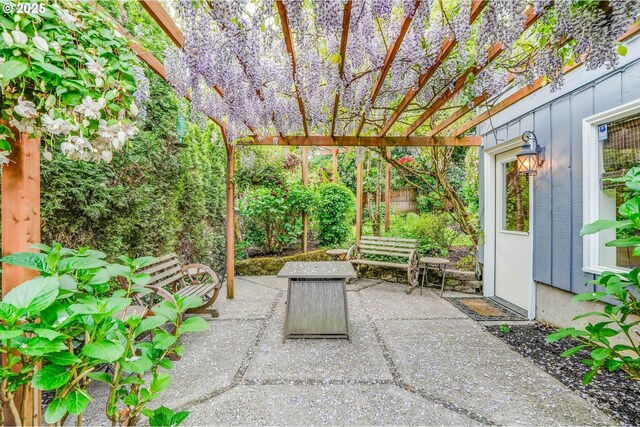 view of patio featuring a pergola