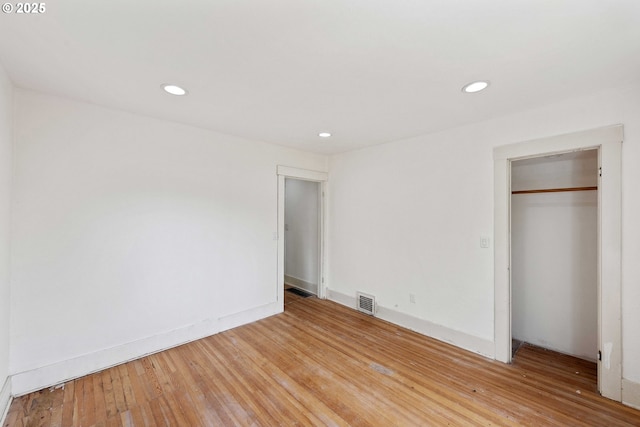 2574 Stanton Ave, North Bend, OR 97459 - unfurnished bedroom with light wood-type flooring, recessed lighting, and a closet