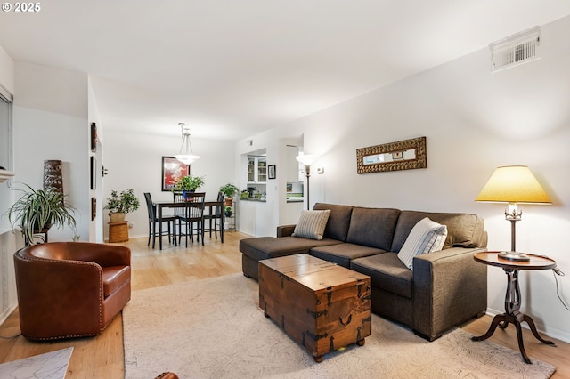 6665 W Burnside Rd, Portland, OR 97210 - living room with light wood-style flooring and baseboards