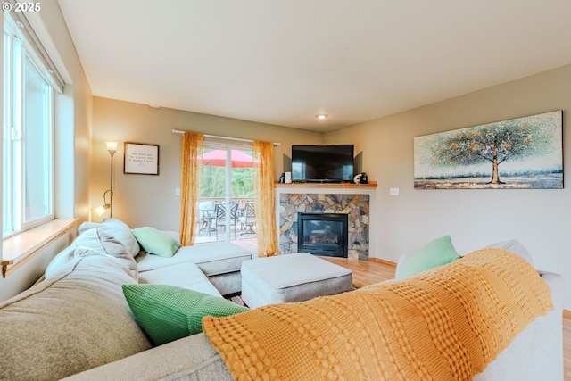 595 Cozy Way, Woodburn, OR 97071 - living room featuring wood finished floors and a fireplace