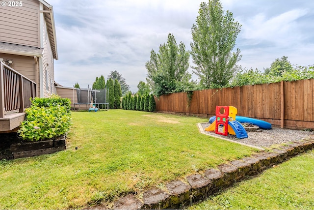 595 Cozy Way, Woodburn, OR 97071 - fenced backyard with a trampoline