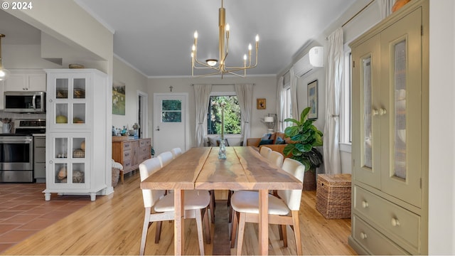 dining space featuring a wall unit AC, a chandelier, and crown molding
