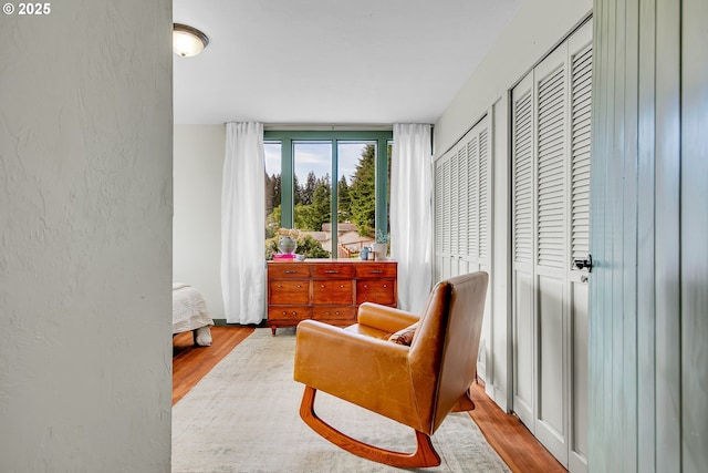 living area with wood finished floors