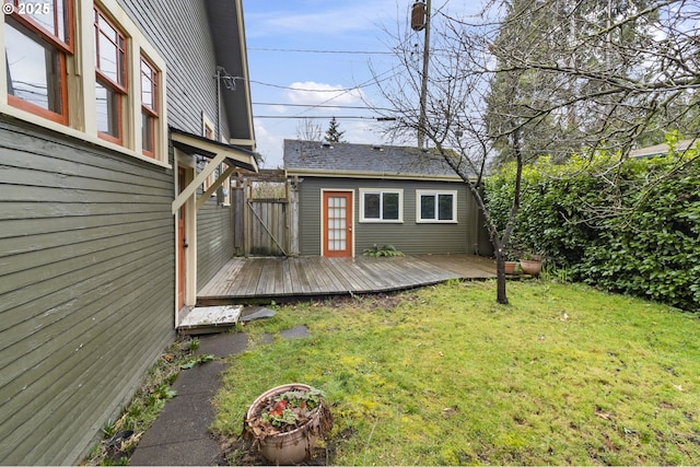 view of yard featuring a gate and a wooden deck