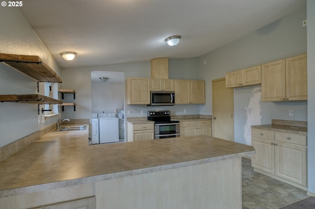 kitchen with independent washer and dryer, light brown cabinets, stainless steel appliances, and a sink