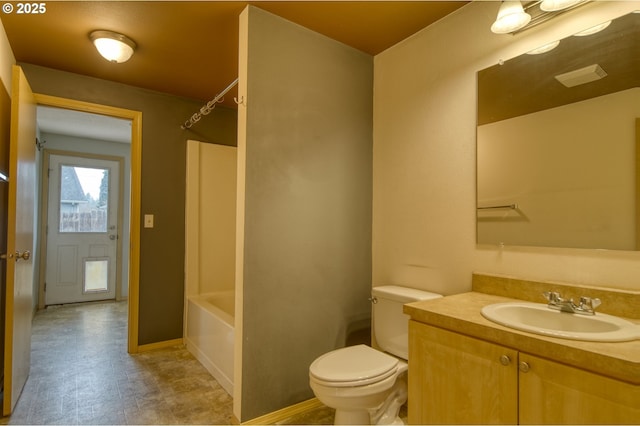 full bath with toilet, vanity, shower / bathing tub combination, and baseboards