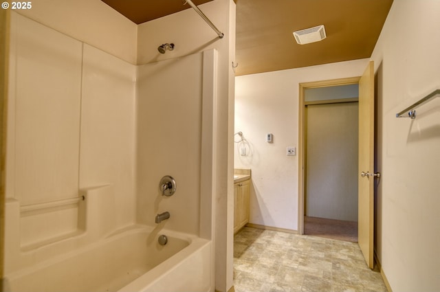 full bathroom with visible vents, baseboards, vanity, and washtub / shower combination