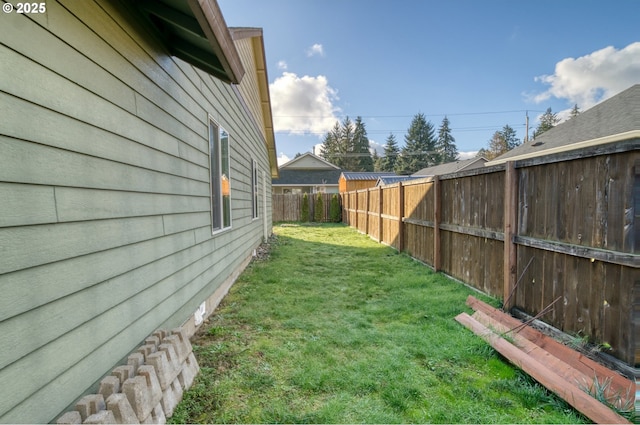 view of yard featuring a fenced backyard