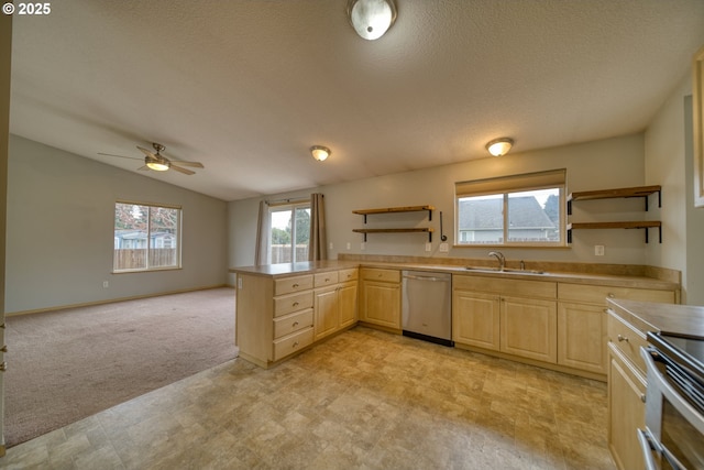 kitchen featuring dishwasher, open shelves, a sink, and light brown cabinetry