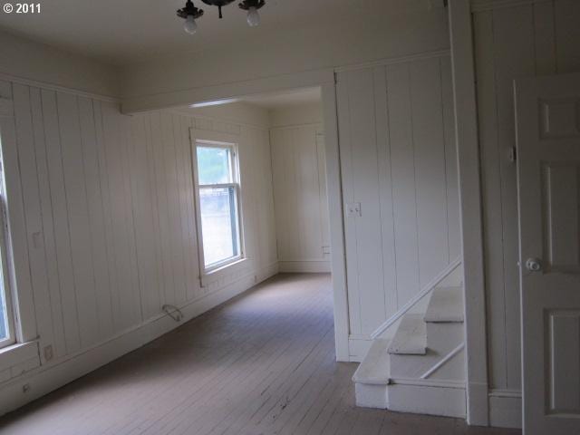 1725 SE Mill St, Roseburg, OR 97470 - spare room featuring wood finished floors