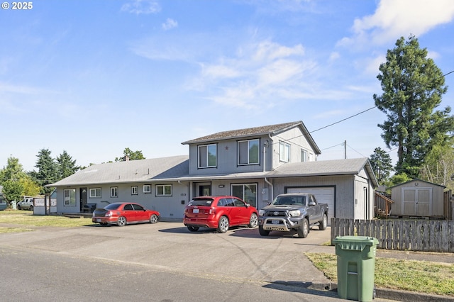 1135 Birch Ave, Cottage Grove, OR 97424 - view of front of home featuring a shed, a garage, and concrete driveway