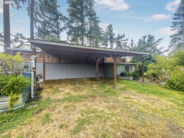 34360 NE Colorado Lake Dr Unit 996, Corvallis, OR 97333 - view of vehicle parking with a detached carport and driveway