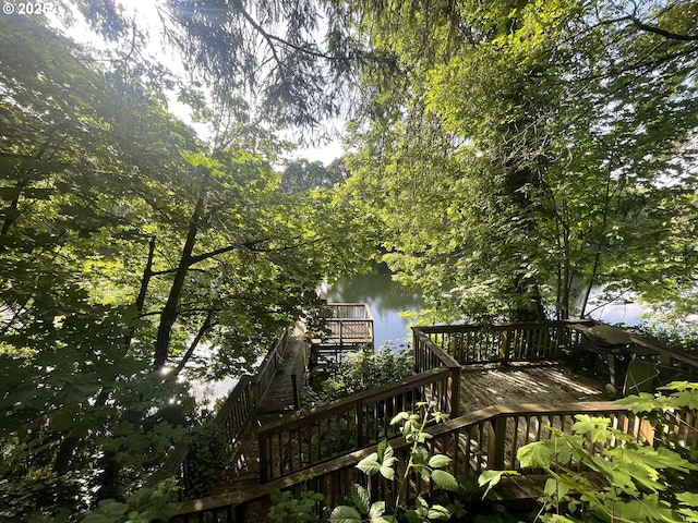 34360 NE Colorado Lake Dr Unit 996, Corvallis, OR 97333 - wooden deck with stairs and a water view
