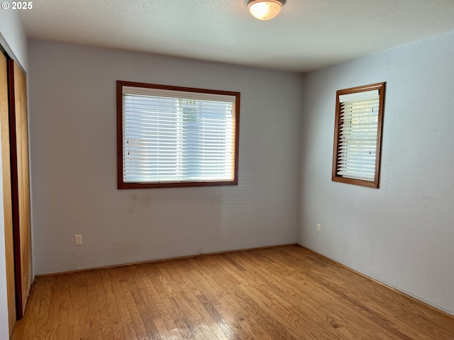 3715 Coho Pl, Cannon Beach, OR 97110 - unfurnished bedroom with a closet and light wood-style flooring