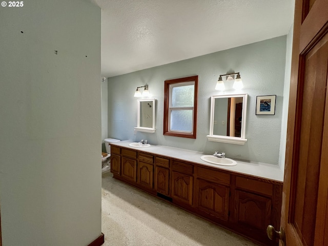 3715 Coho Pl, Cannon Beach, OR 97110 - bathroom featuring double vanity and toilet