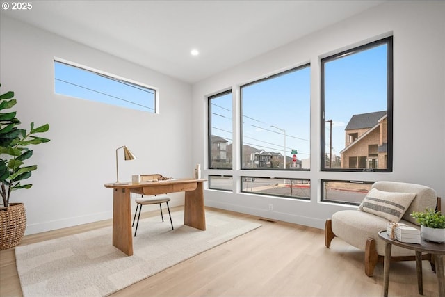 home office featuring recessed lighting, visible vents, baseboards, and light wood-style floors