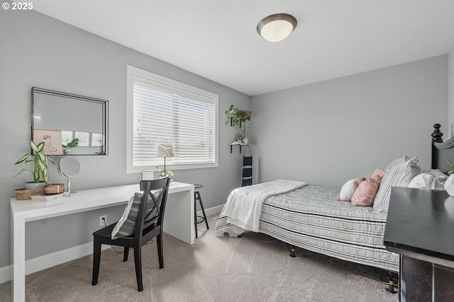 21163 SW Nursery Way, Sherwood, OR 97140 - carpeted bedroom with a desk and baseboards