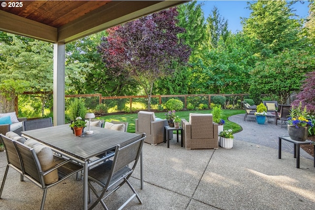 21163 SW Nursery Way, Sherwood, OR 97140 - fenced backyard with outdoor dining space and a patio