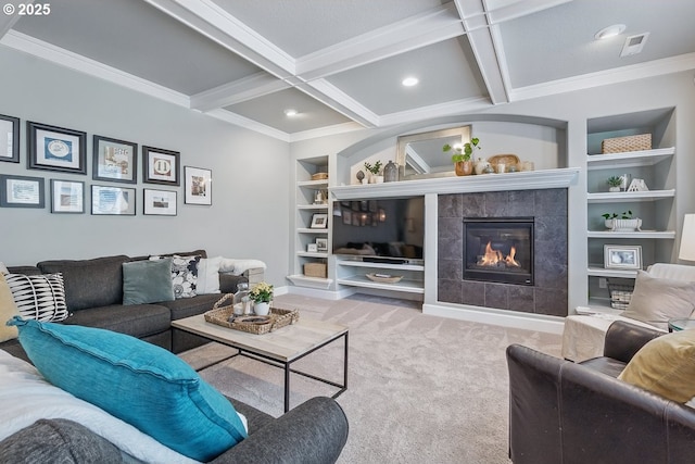 21163 SW Nursery Way, Sherwood, OR 97140 - carpeted living room with built in features, beamed ceiling, a fireplace, ornamental molding, and recessed lighting