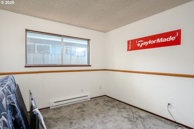 10904 SW 62nd Pl, Portland, OR 97219 - spare room with a baseboard radiator, carpet floors, a textured ceiling, and baseboards