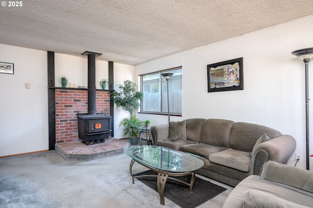 10904 SW 62nd Pl, Portland, OR 97219 - carpeted living area featuring a wood stove, a textured ceiling, and baseboards