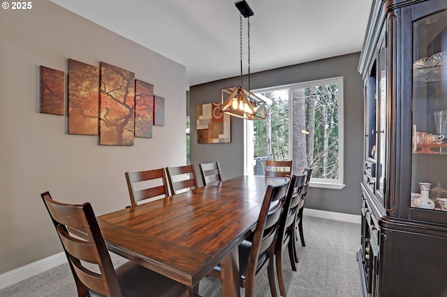 view of carpeted dining space