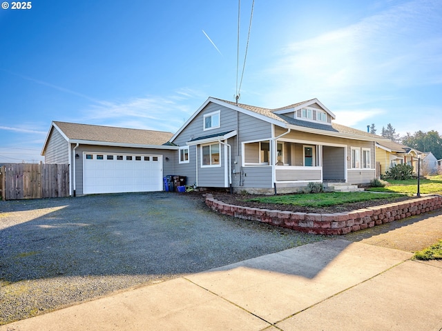 view of front facade featuring a garage and covered porch