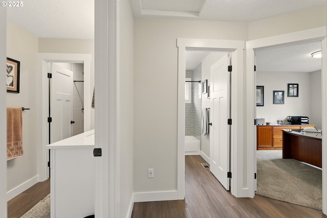 304 SW Birdsdale Dr, Gresham, OR 97080 - hall with wood finished floors, an office area, and baseboards