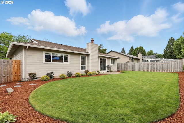 304 SW Birdsdale Dr, Gresham, OR 97080 - rear view of property with a chimney and a patio area