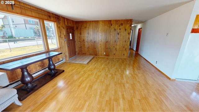 29730 Hillcrest St, Gold Beach, OR 97444 - empty room with light wood finished floors, wooden walls, and baseboards