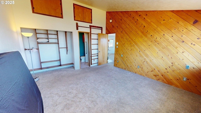 29730 Hillcrest St, Gold Beach, OR 97444 - unfurnished bedroom featuring carpet and wood walls