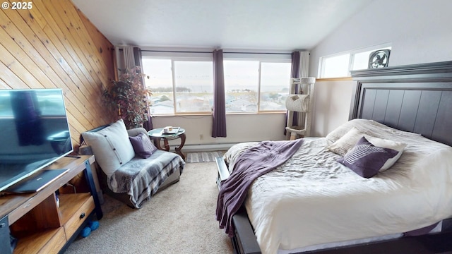 bedroom featuring lofted ceiling, light carpet, and wood walls