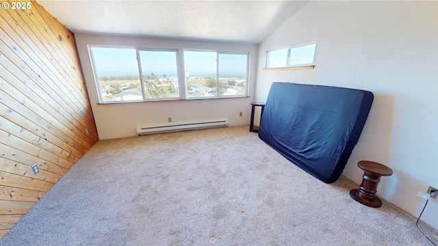 29730 Hillcrest St, Gold Beach, OR 97444 - carpeted bedroom with baseboard heating, wooden walls, and vaulted ceiling