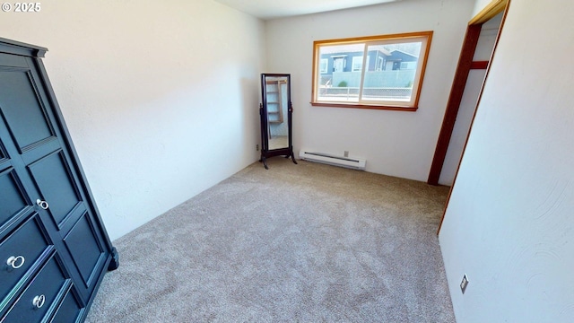 29730 Hillcrest St, Gold Beach, OR 97444 - spare room with a baseboard heating unit and carpet flooring