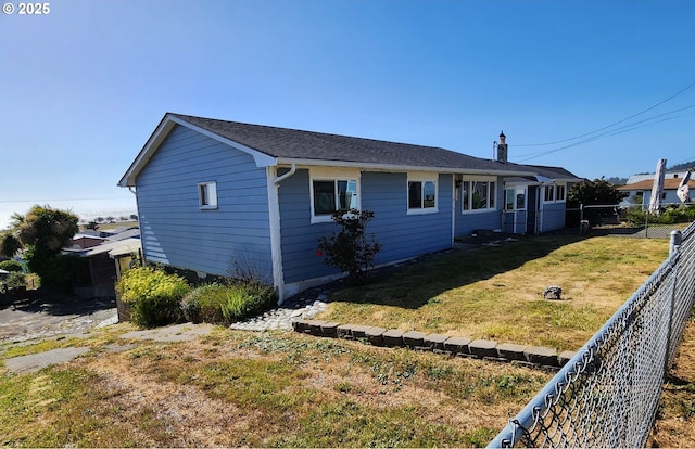 29730 Hillcrest St, Gold Beach, OR 97444 - view of home's exterior with a chimney