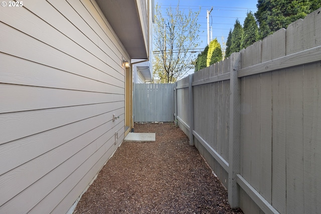 view of home's exterior featuring fence