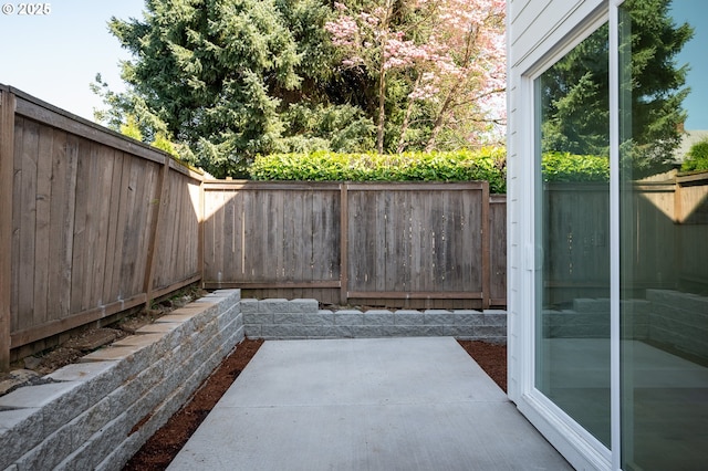 view of patio with a fenced backyard