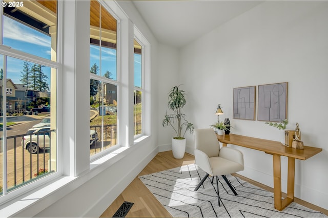 2258 Satter St, West Linn, OR 97068 - home office with plenty of natural light, wood finished floors, and baseboards