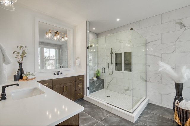 full bath featuring a stall shower, marble look tile flooring, vanity, and recessed lighting