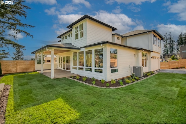 2258 Satter St, West Linn, OR 97068 - rear view of property with asphalt driveway, central air condition unit, a patio, and an attached garage