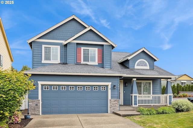 802 N 28th Ave, Cornelius, OR 97113 - craftsman-style home with a porch, concrete driveway, a garage, and stone siding
