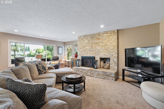 7250 SW Arbor Lake Dr, Wilsonville, OR 97070 - living area featuring recessed lighting, carpet, a textured ceiling, and a fireplace
